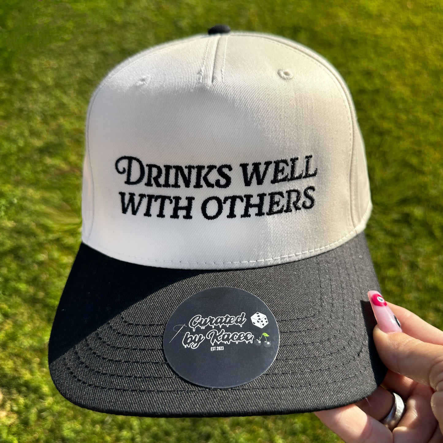 Drinks Well With Others Embroidered Trucker Hat