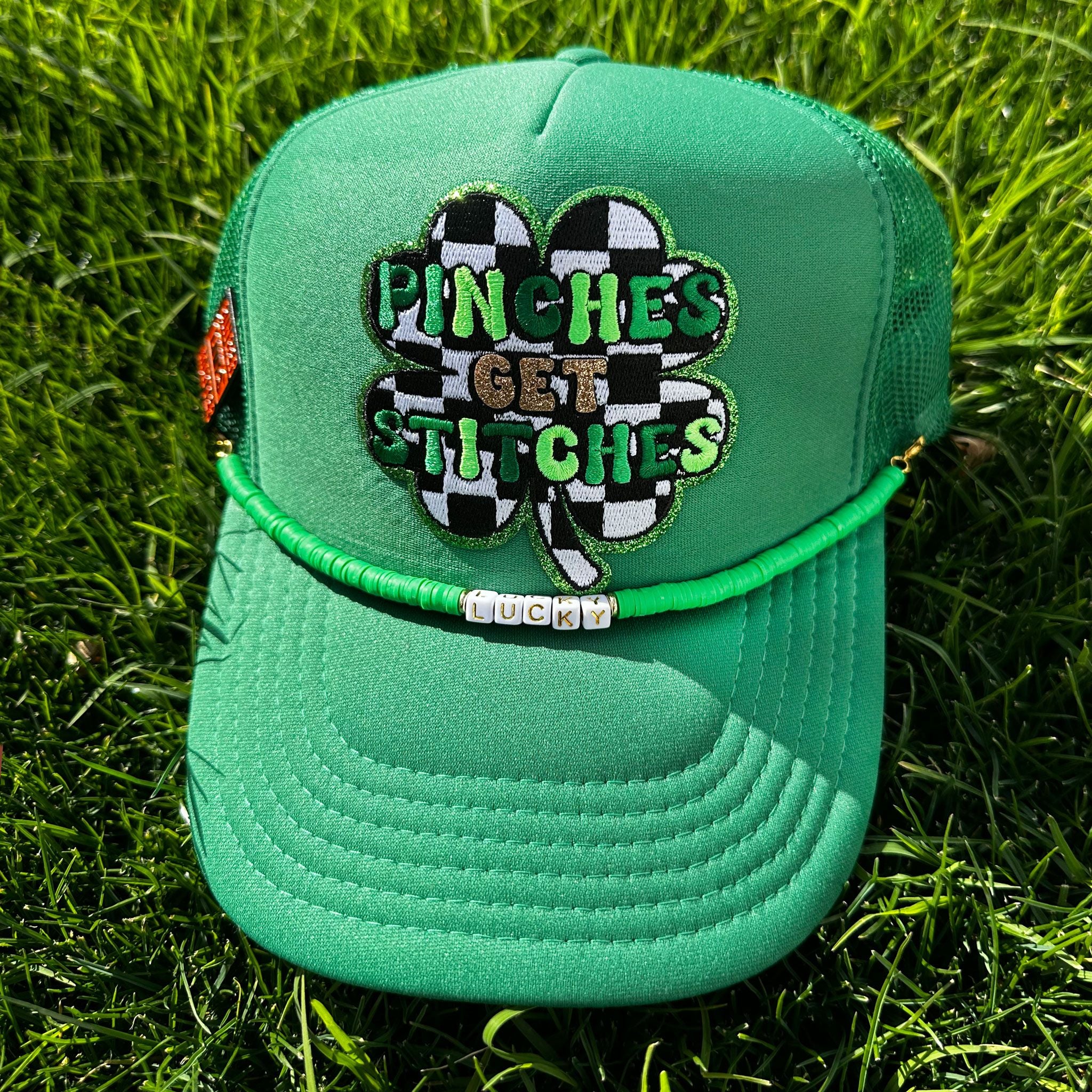 Pinches Get Stitches Trucker